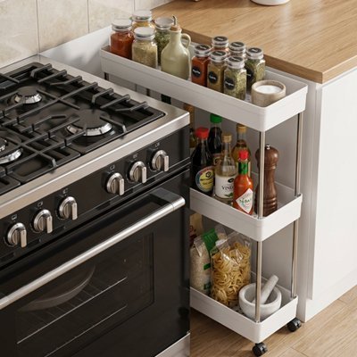 desserte placée entre mur et cuisinière bon stokage