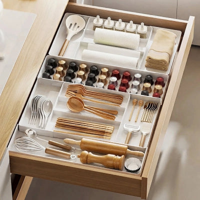 grand tiroir bien rangé avec range couverts extensible