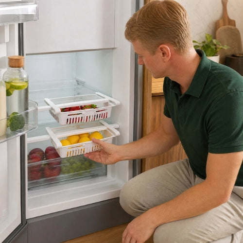 panier cuisine coulissant homme le place délicatement dans son frigo
