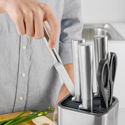 main prend couteau porte coteau en acier  inoxydable à disposition