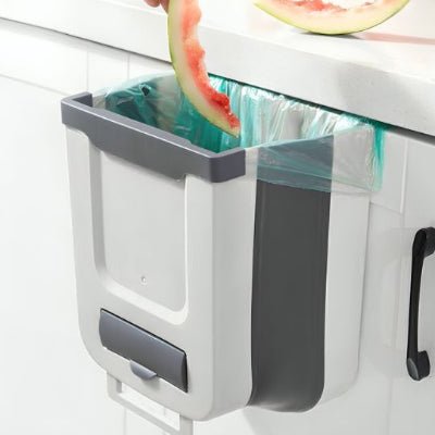 poubelle cuisine sous evier blanche gris accrochée jetant epluchure pastèque