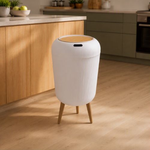 poubelle design cannelée sur trépied dans un espace culinaire