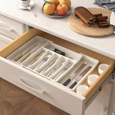 range couvert blanc extensible avec ustensiles fouet tire-bouchon