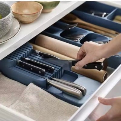 tiroir organisé range couverts tiroir chic main prend couteau
